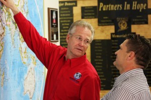 David showing the destinations of the 80+ containers sent out from Hands of Hope NW
