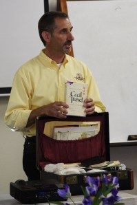 Todd sharing from the suitcase of items from his Grandmother's time as a missionary kid in China, and as a missionary herself in Honduras